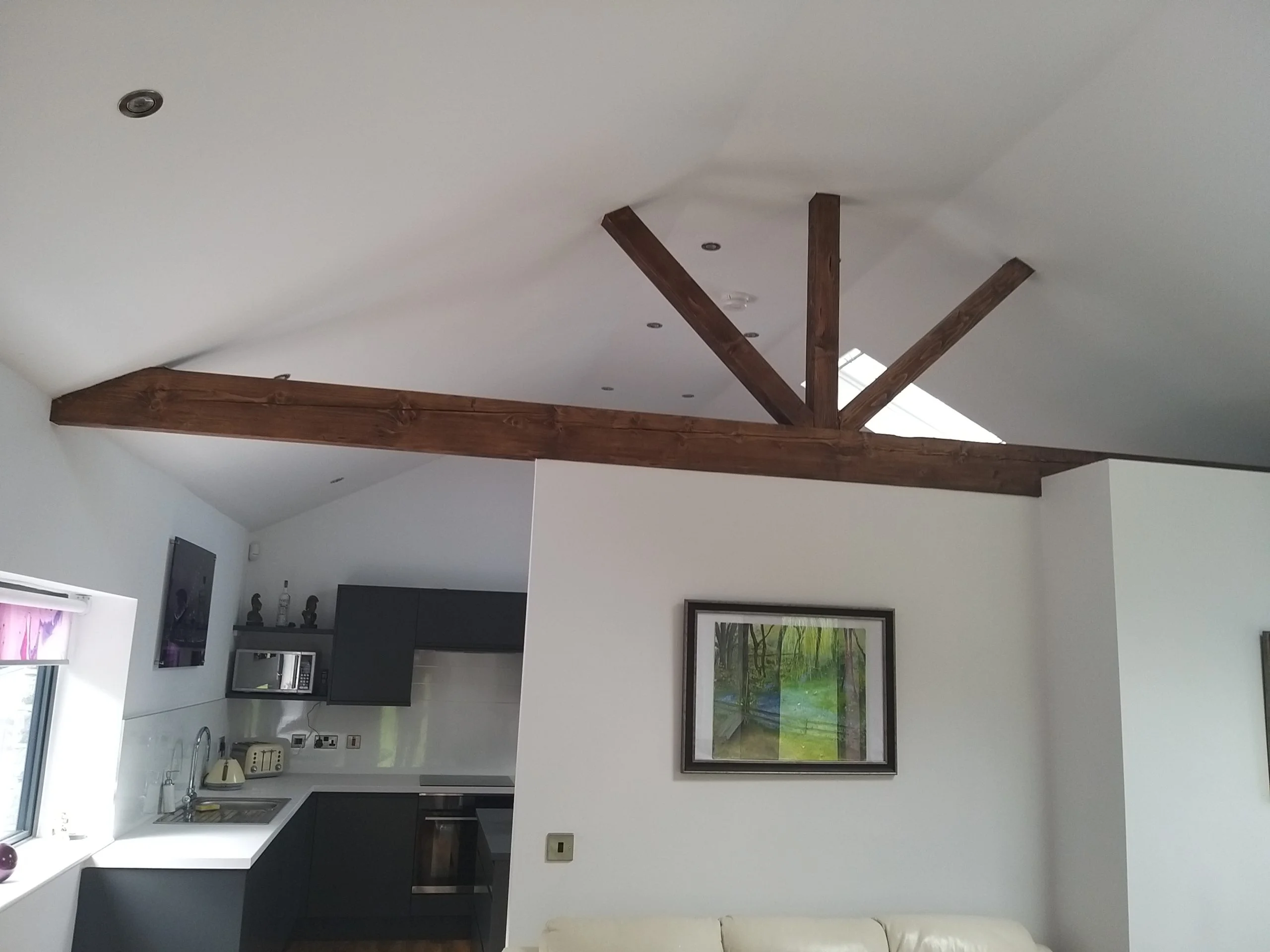 Wooden joist beams in a garage conversion