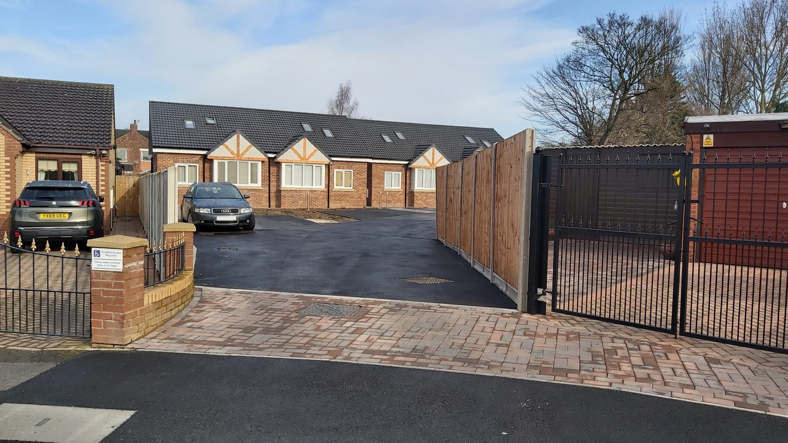 on street view of new build bungalow with driveway