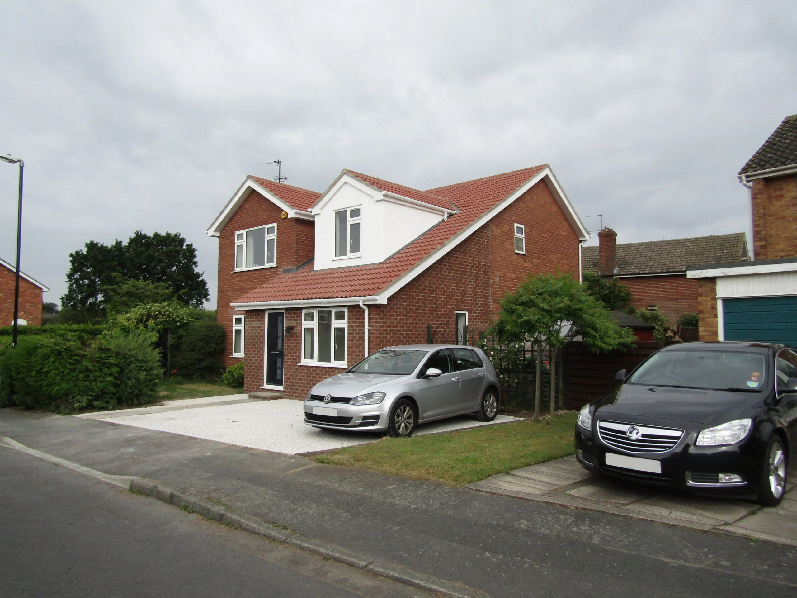 Second front of house view of loft conversion and extension