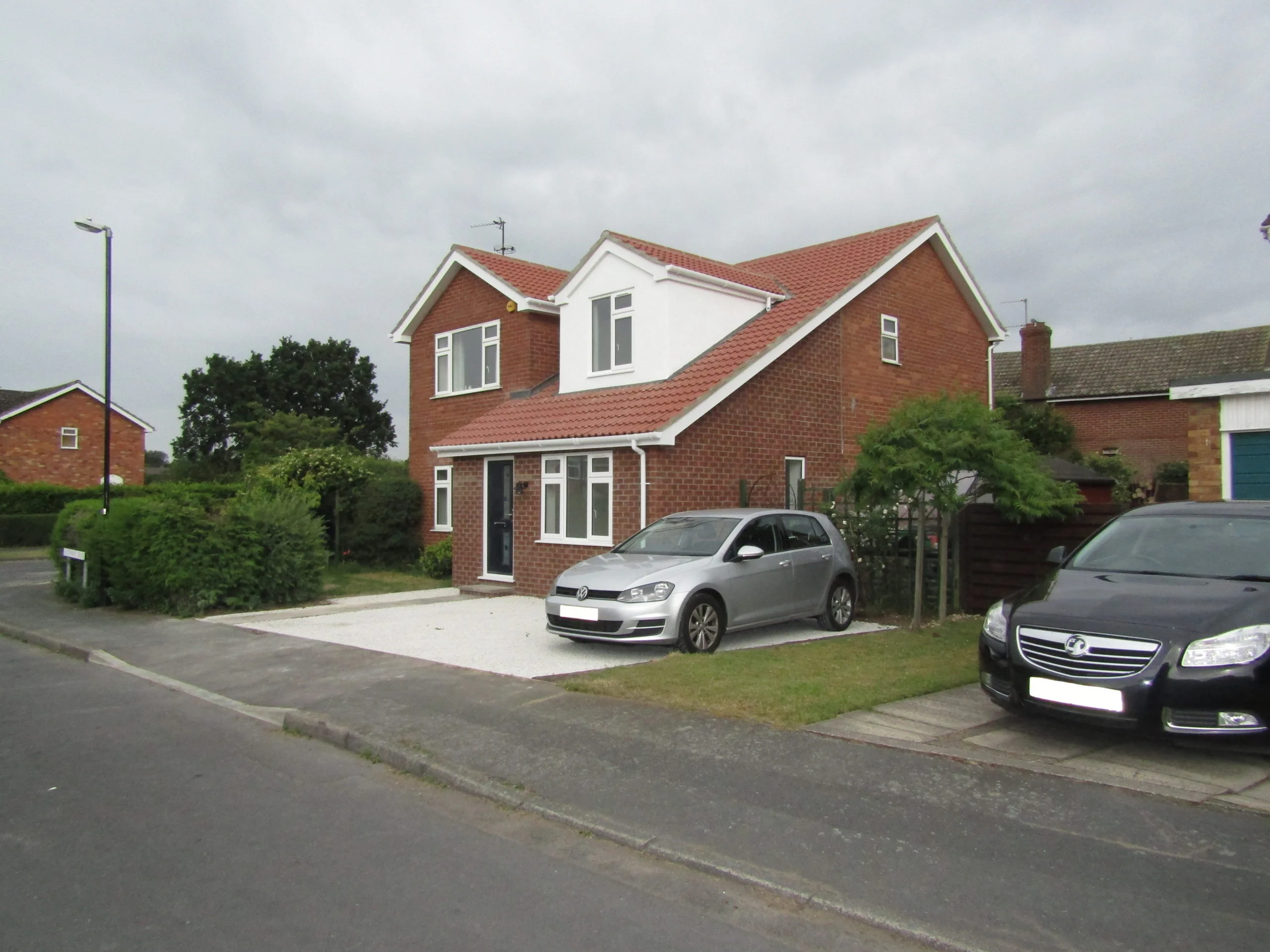 Front of house view of dormer loft conversion and extension