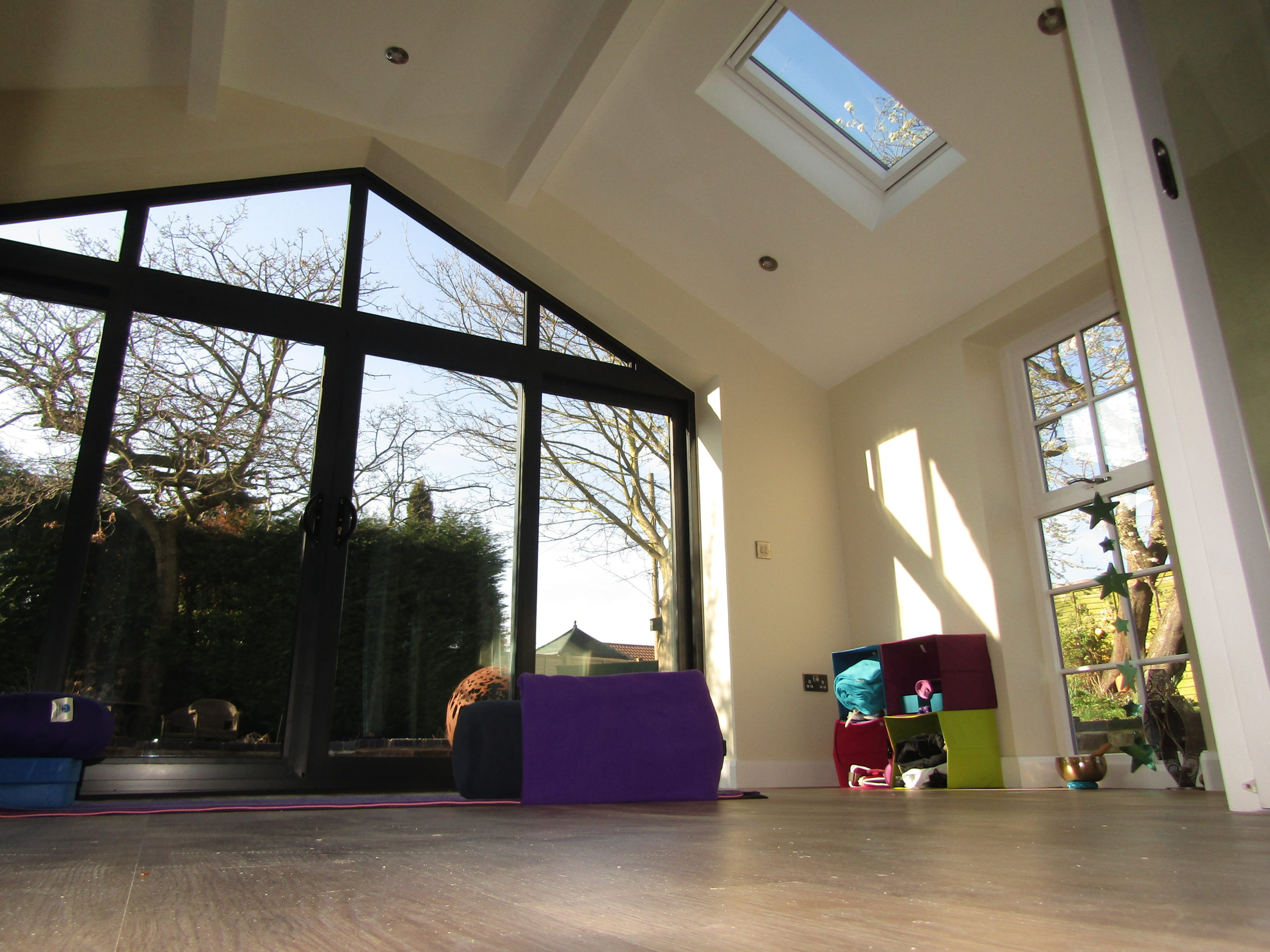 ceiling view of garage conversion with skylight
