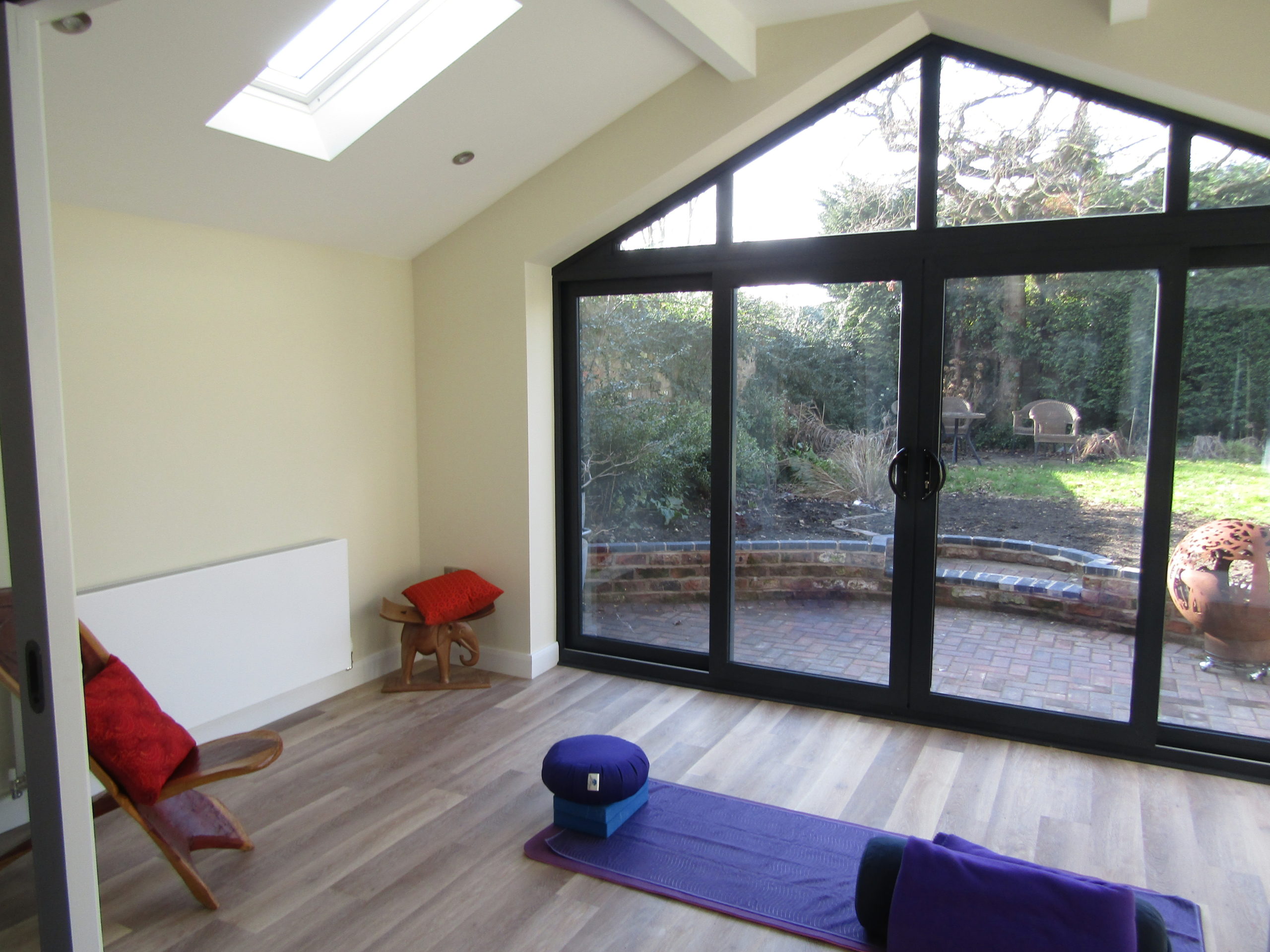 Yoga mat and block inside garage conversion