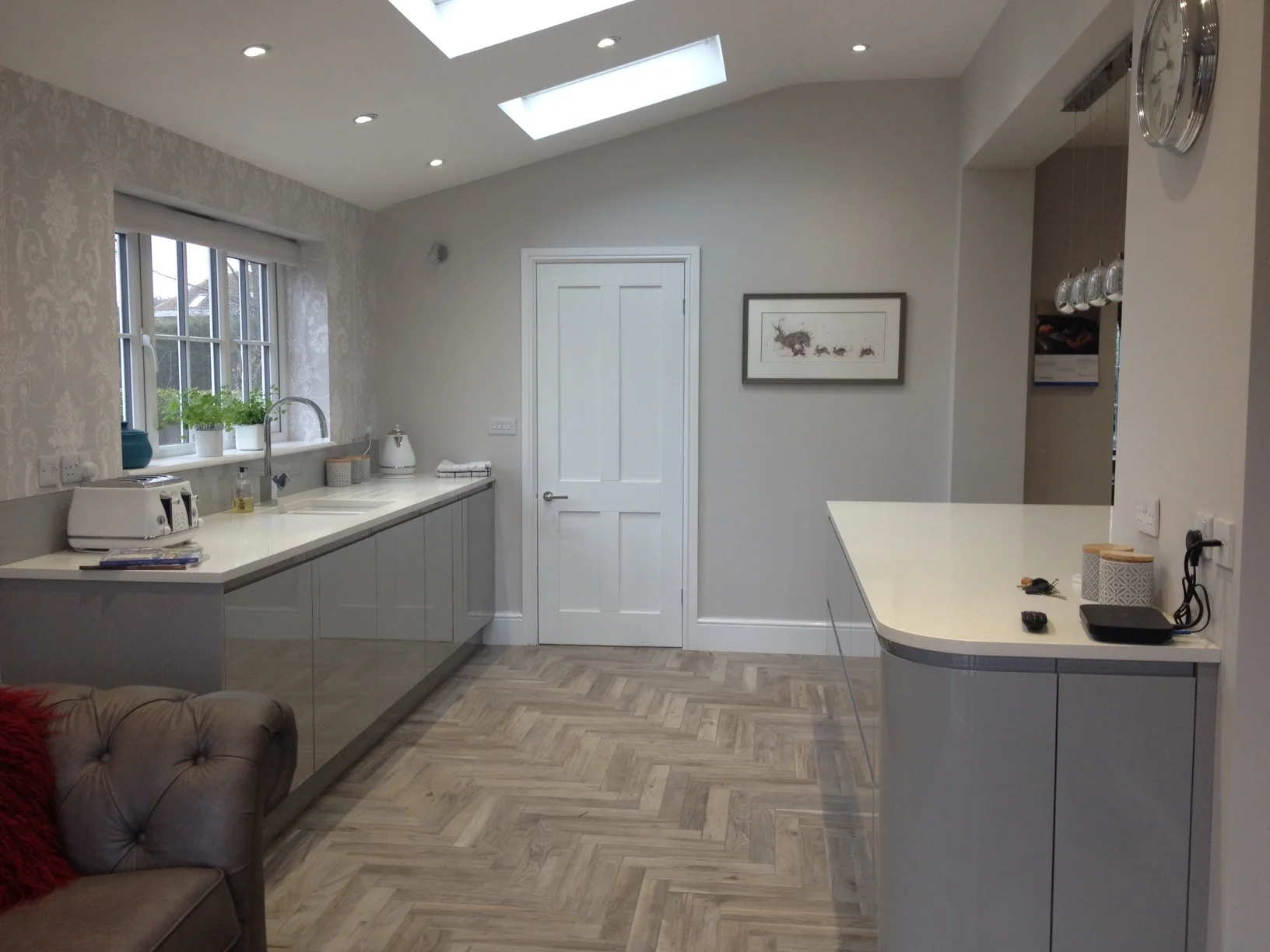 Modern grey kitchen in wrap extension