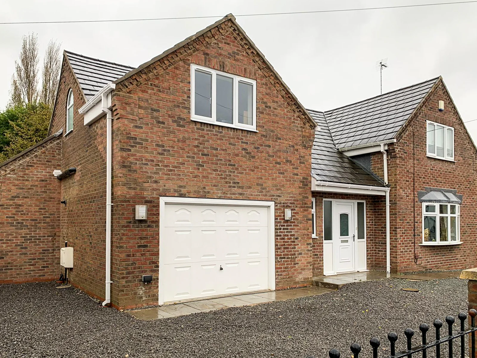 Street view of double storey extension in Bradford